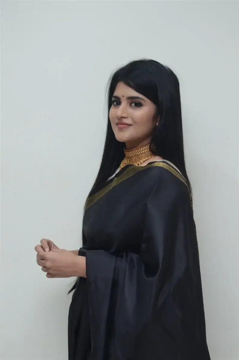 Megha Akash in Black Saree at Manu Charitra Telugu Movie Trailer Launch